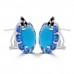 9.71 ct Oval Shaped Turquoise, Tanzanite and Black Diamond Earrings in 14 kt White Gold 9.71 ct Oval Shaped Turquoise, Tanzanite and Black Diamond Earrings in 14 kt White Gold